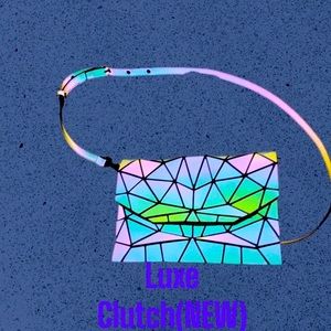 Original LUXE Clutch,Never used (match with ensemble)